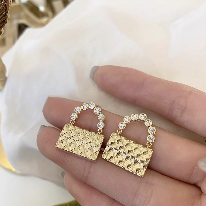 Chic girl fashion delicate bag personality trend luxury earrings.