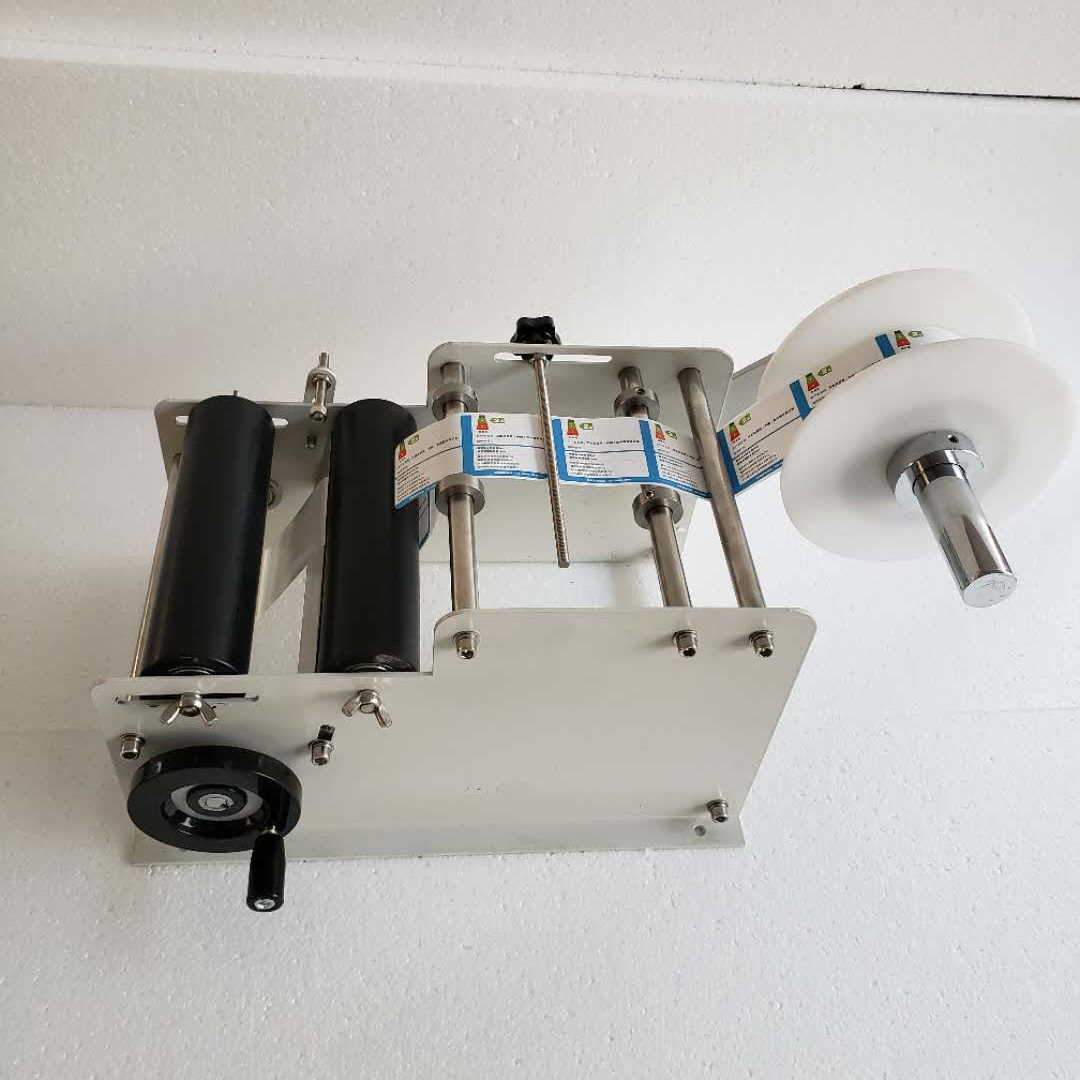 Máquina de etiquetado manual guangtao packaging & printing machinery