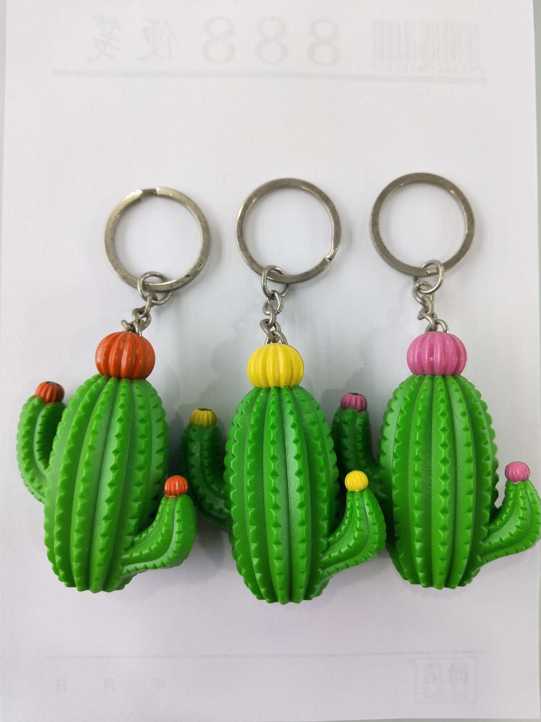 Jianqing Cactus LED laser Light Emitting Light and Sound Keychain Pendant Wholesale 01 details Picture