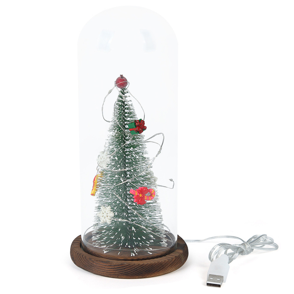 A large artificial Christmas tree with a transparent dust-proof glass cover is a home decoration for the living room and bedroom Item Picture