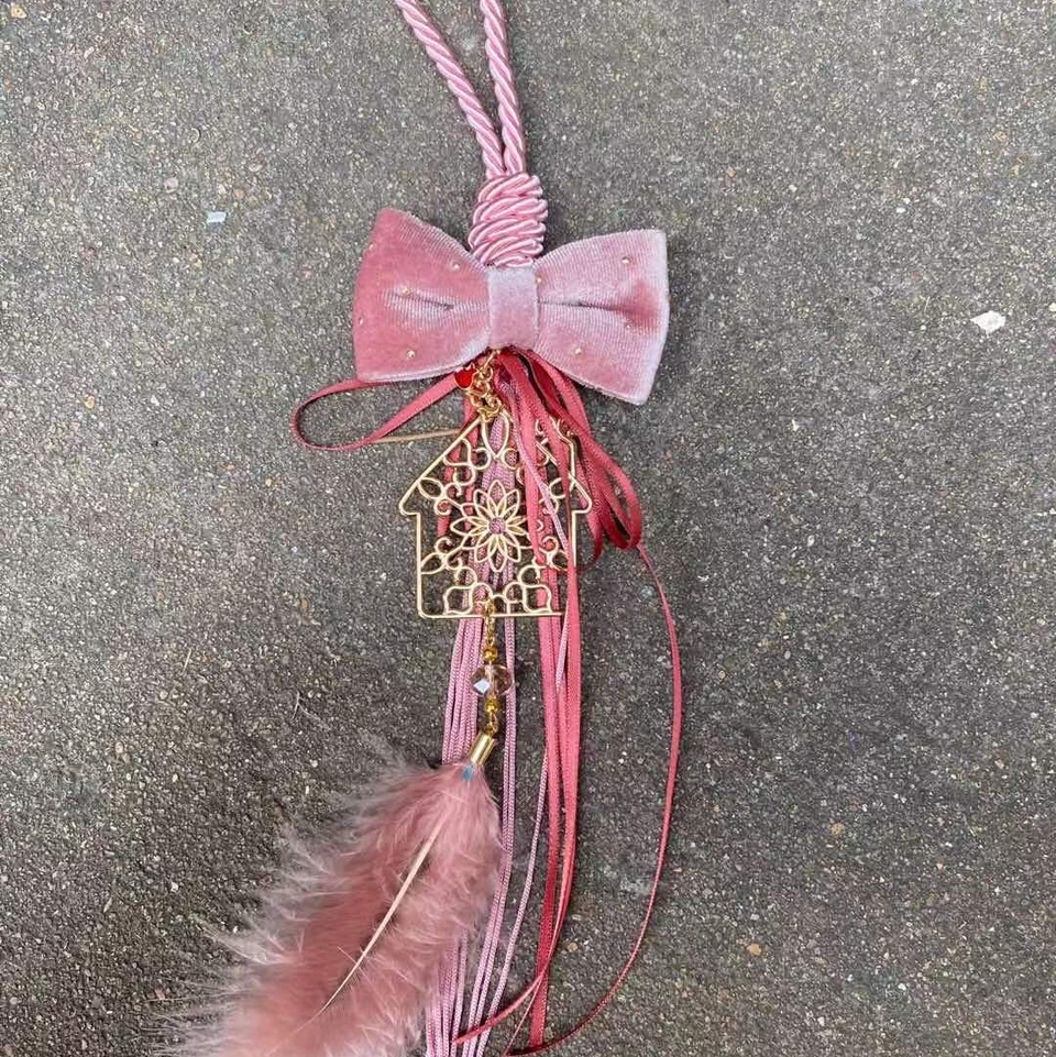 Pink bow pendant