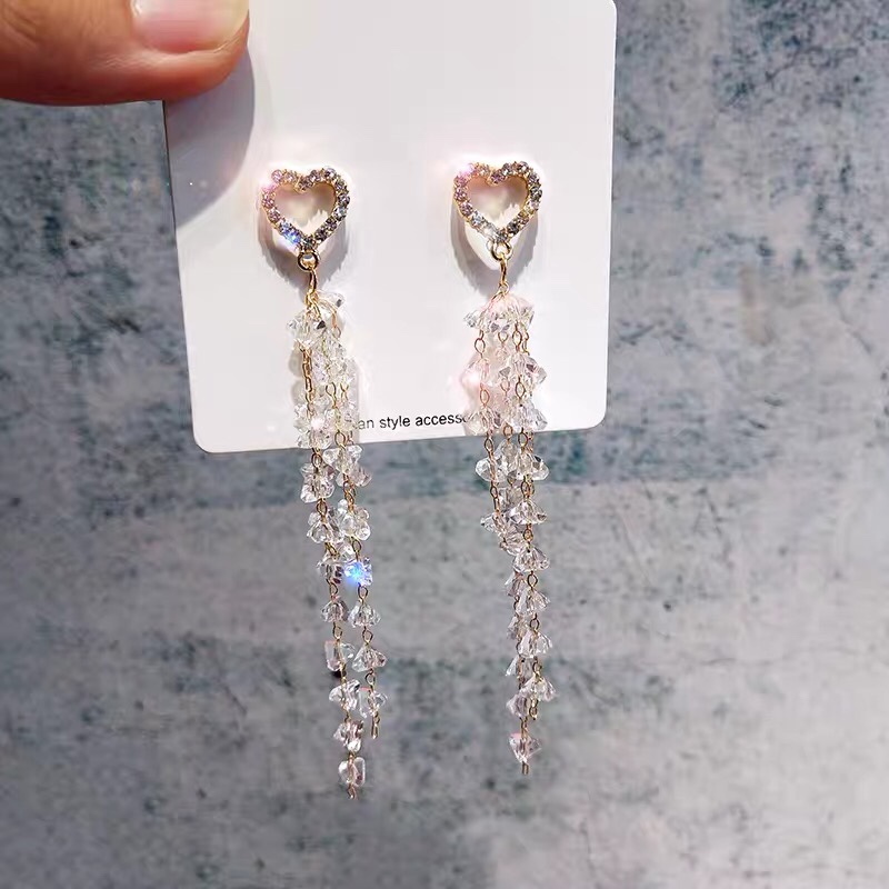 Retro fashion trend Bohemian national style fake flowy Su earrings