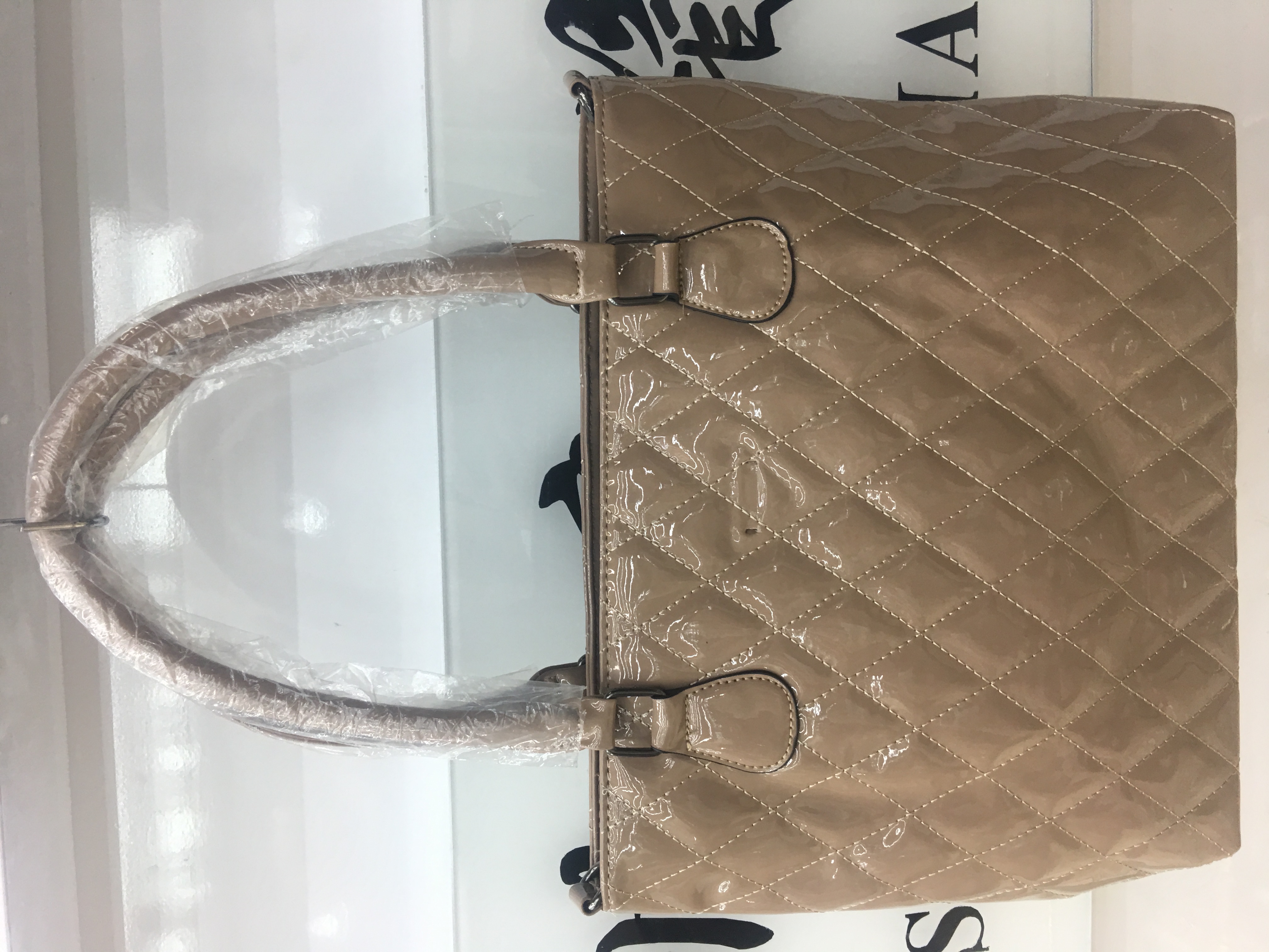 2021年时尚简约半PU休闲新款特价双口手提包SK07
产品图