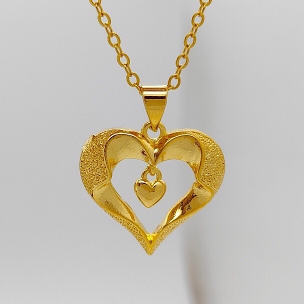 Heart to Heart sand face pendant