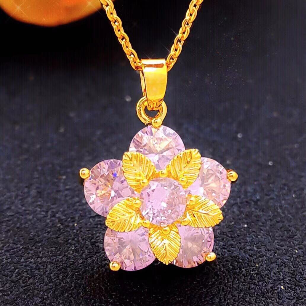 Pink rotating zircon leaf pendant