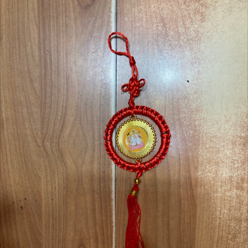 a pendant red ring hanging boy Guanyin