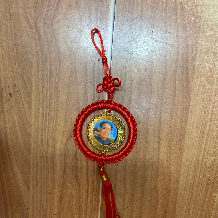 a Pendant red circle hanging figures