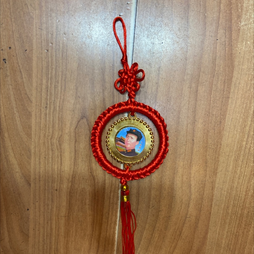 a Pendant red circle hanging leader figure