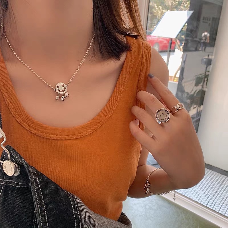The bell smiley face necklace collarbone chain features a light luxury hip-hop personality design and a fresh look details Picture