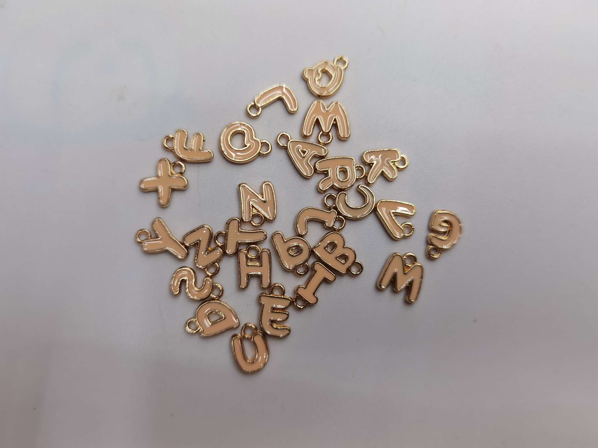 Orange letter pendant details Picture