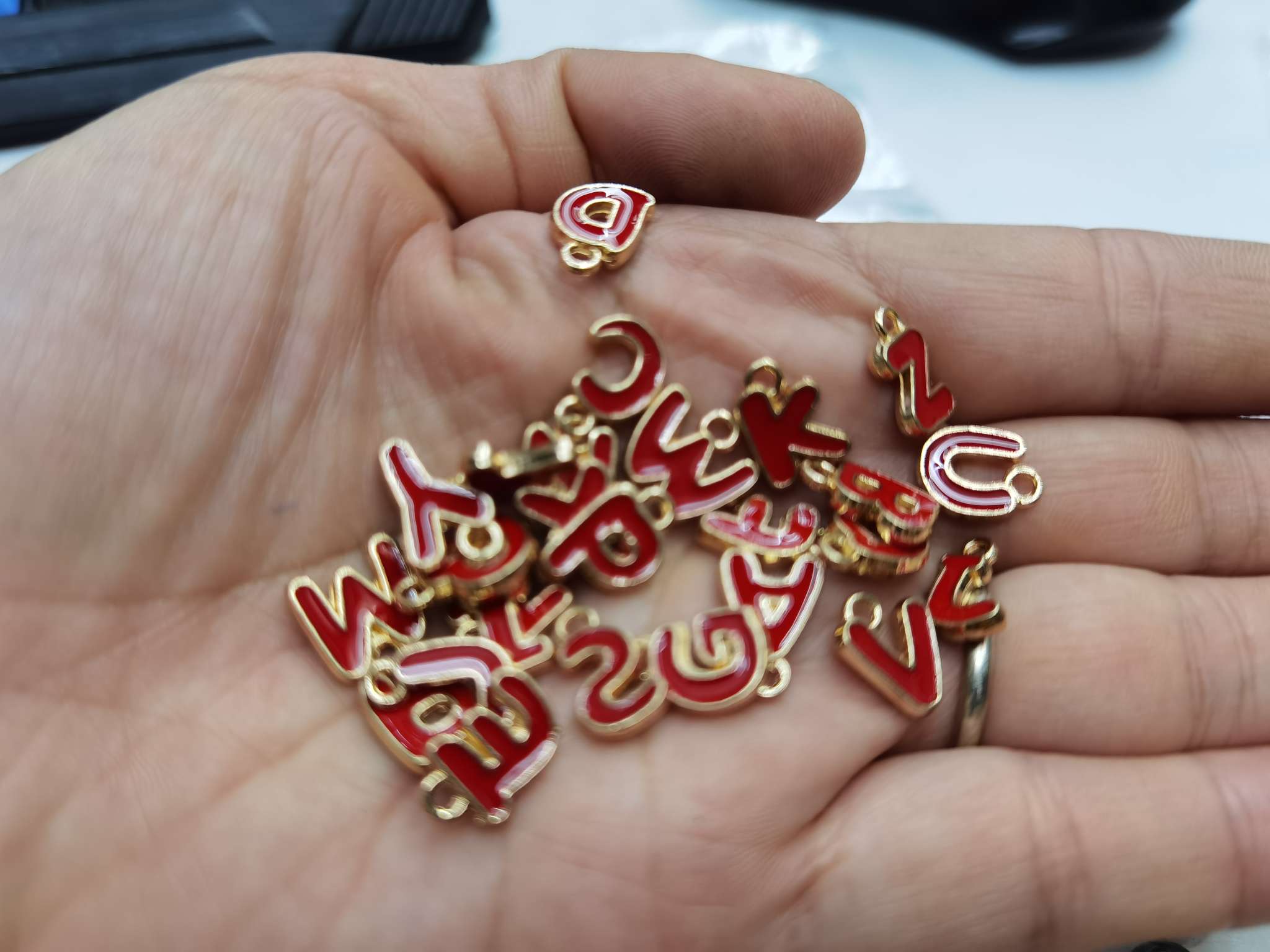 Red letter pendant details Picture