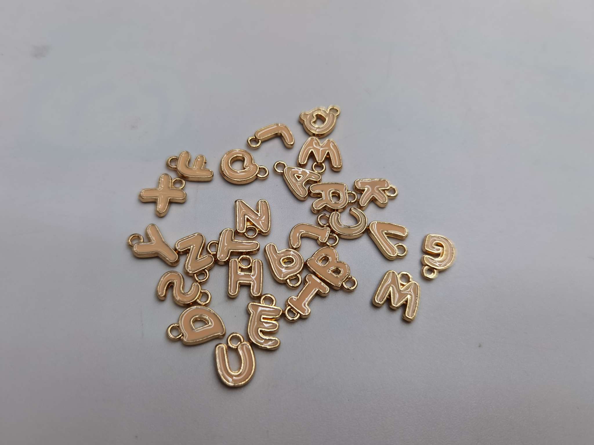 Orange letter pendant Item Picture