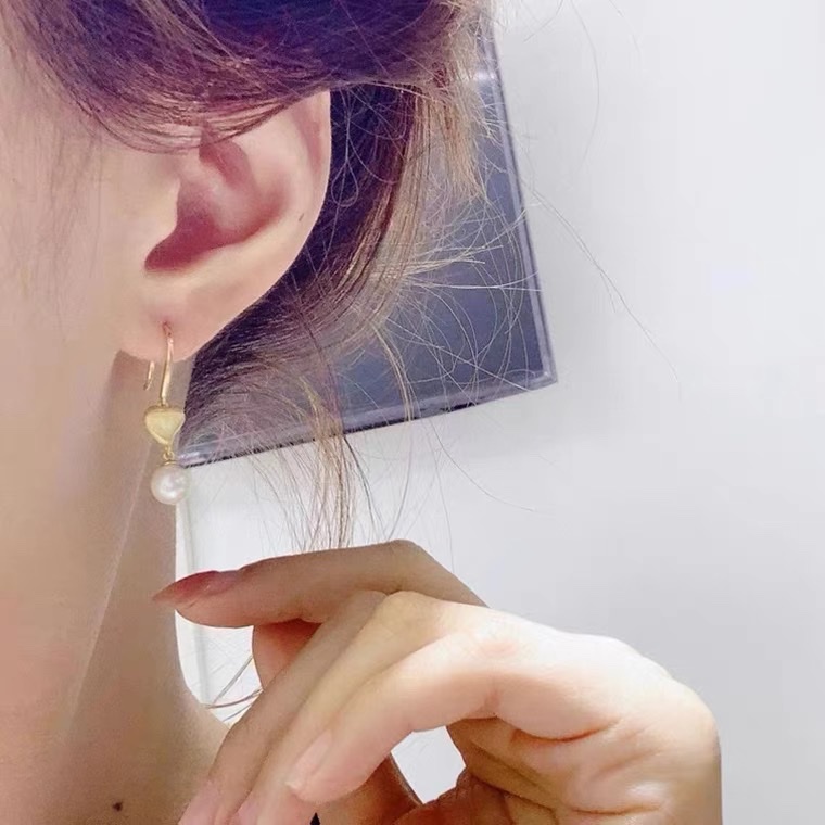 Pearl earrings 3: Star-shaped shell long earrings, retro, exquisite, high-end and elegant, set with zirconium earrings details Picture