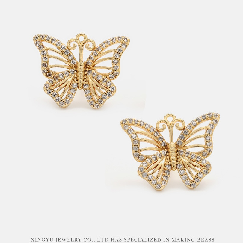Cross-border gilded butterfly earrings manufacturer wholesale jewelry gifts European and American hollowed-out butterfly earrings