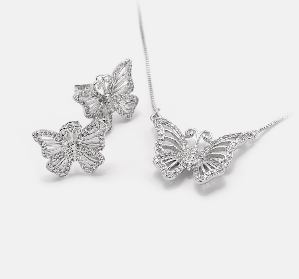 Cross-border gilded butterfly earrings manufacturer wholesale jewelry gifts European and American hollowed-out butterfly earrings detail image 4
