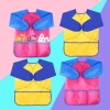 A large L-sized children's art apron comes with a random set of paintbrushes details Picture
