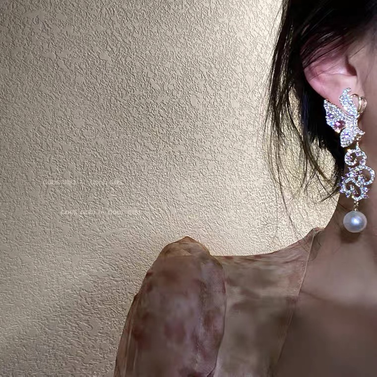 Single butterfly earring Star shell long earring retro delicate high-end atmospheric zirconium earring