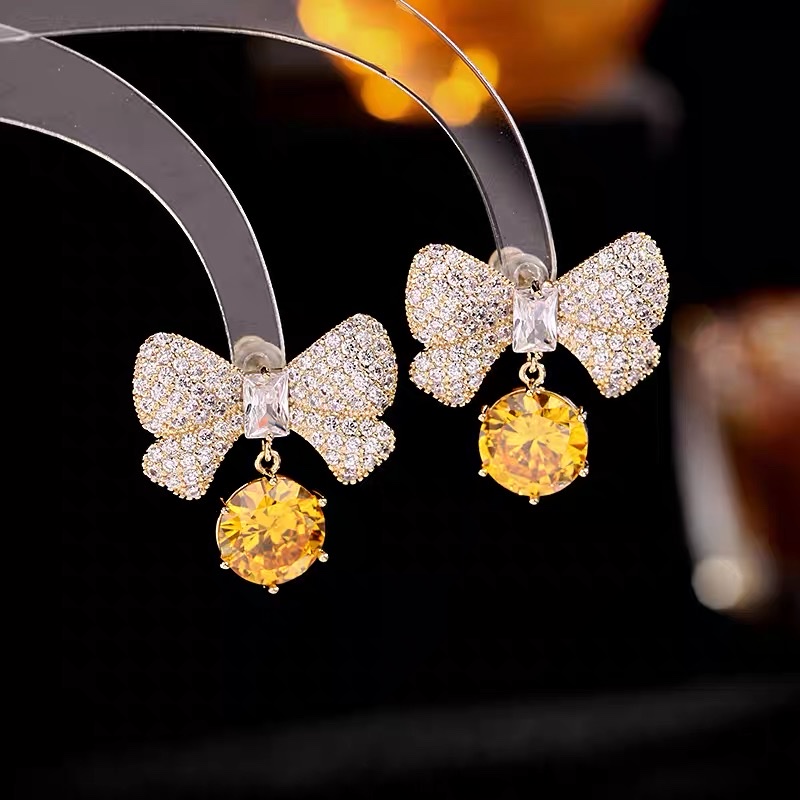 Yellow bow tie earrings, star-shaped shell long earrings, retro, exquisite, high-end and elegant, with zirconium earrings details Picture