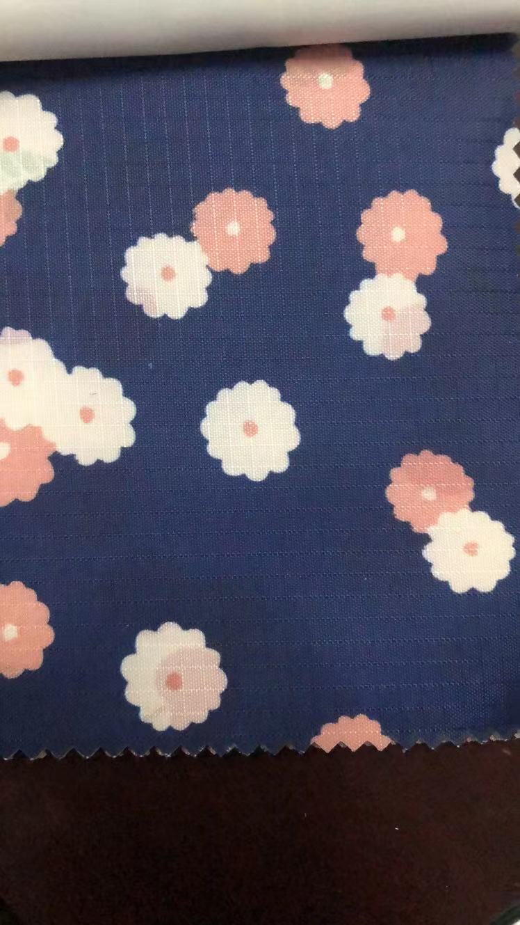 深蓝色小花印花布格子桌布pvc里布洗漱包产品图