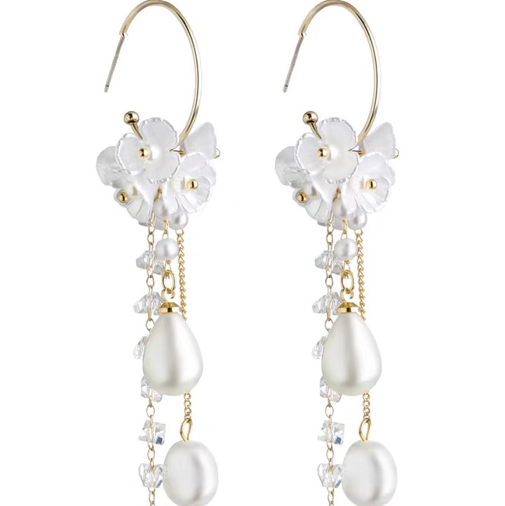 Clover pearl earrings, long star shell earrings, retro, exquisite, high-end and elegant zirconium earrings