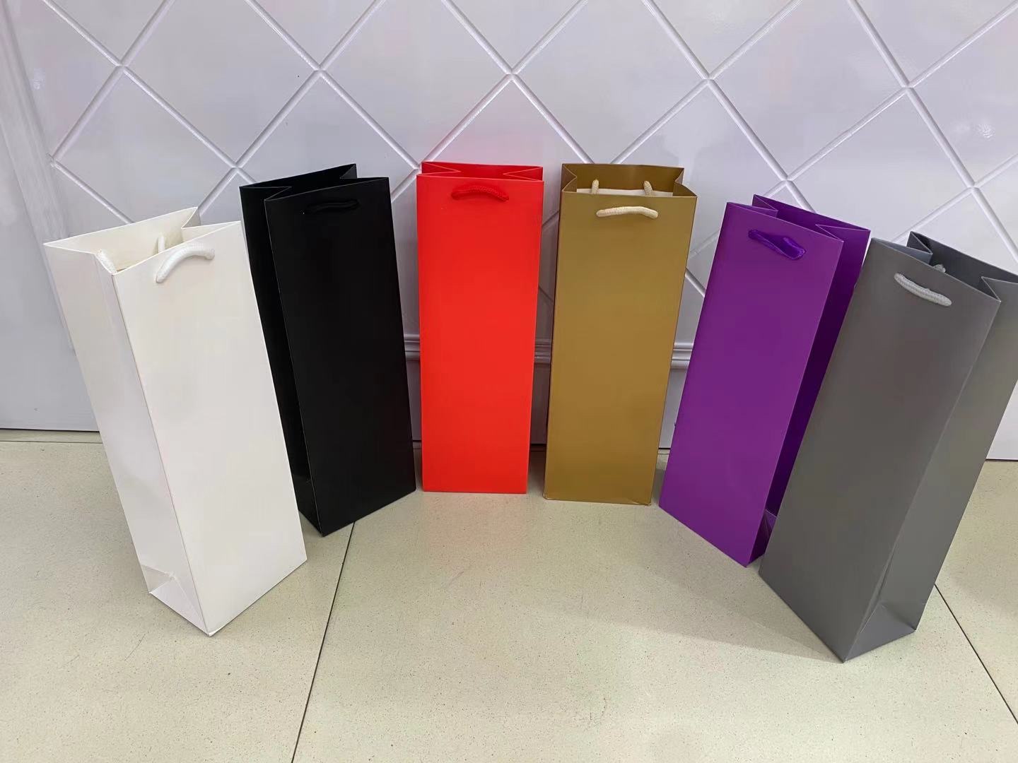 Customized wine bags, hand-held gift paper bags, clothing packaging paper bags, wholesale food takeout packaging bags Specification image