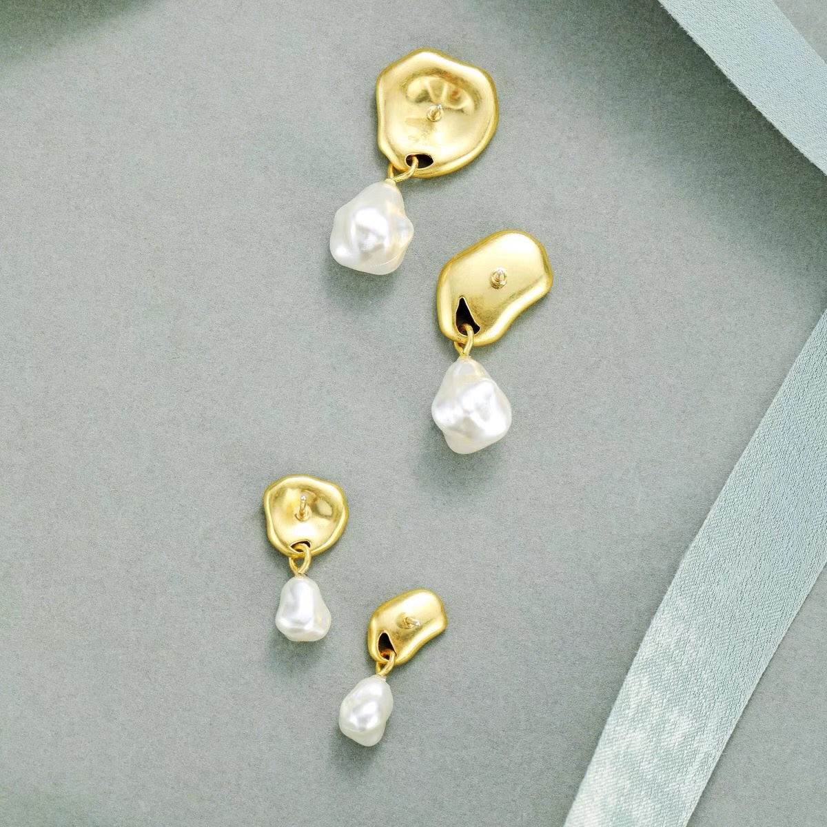 Small and delicate metal texture simple cold wind shell pearl earrings