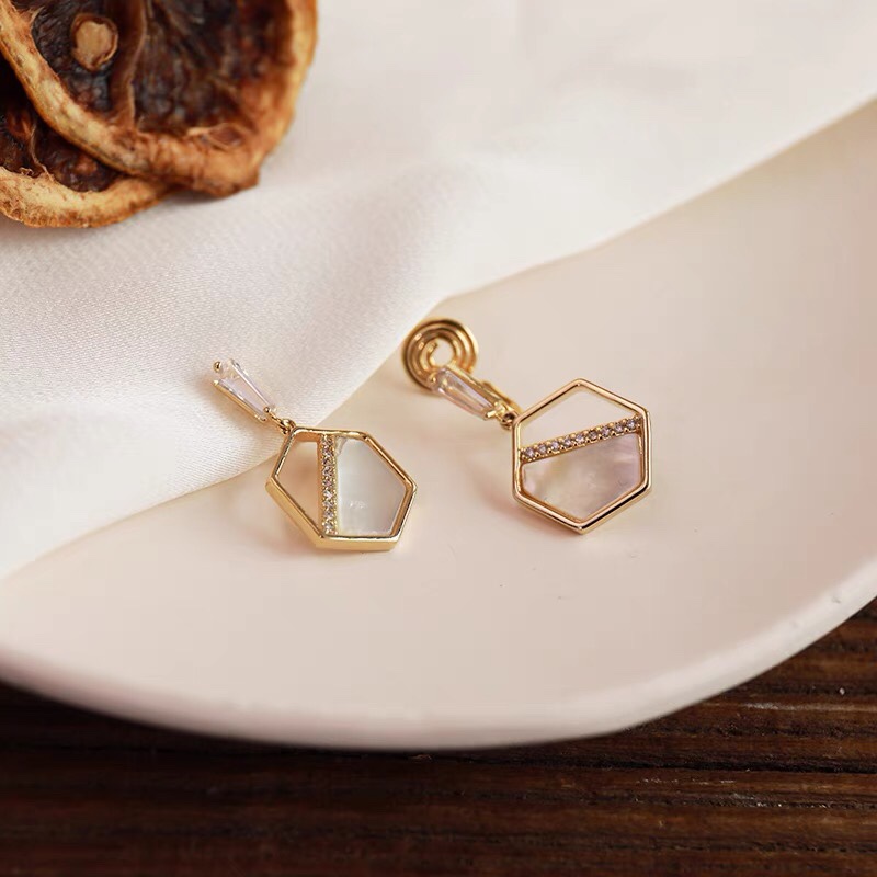 White mother-of-pearl ear-clip earrings with an oil paint-like and elegant style, summer collection without ear piercings