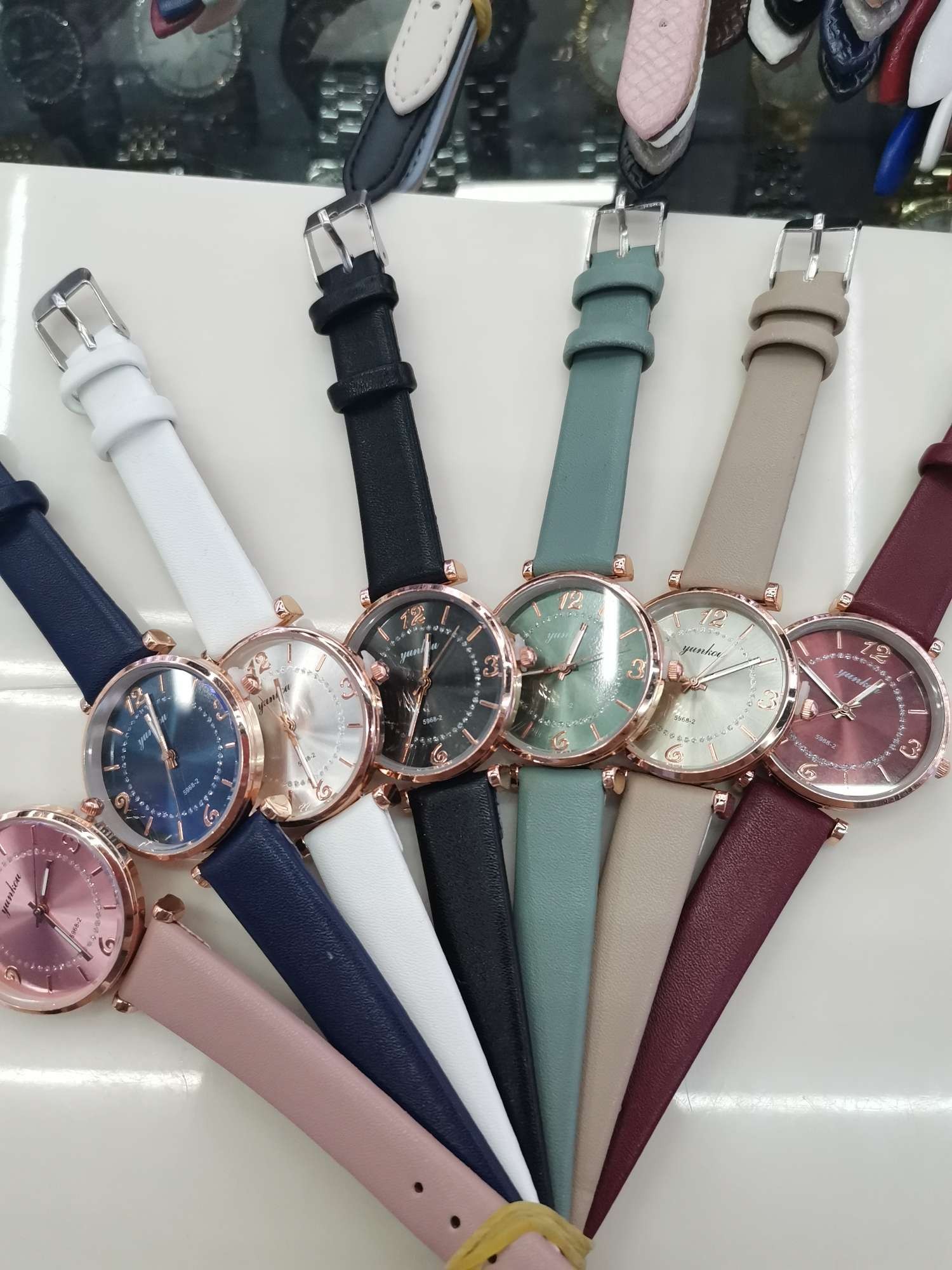 Ladies with multi-colored watches detail image 1