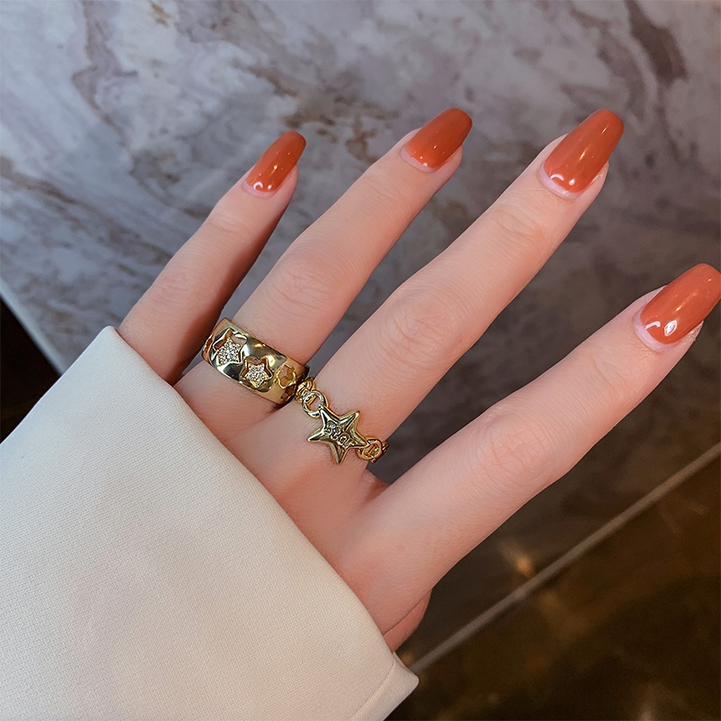 Yuzhu -012 Hollowed-out Five-pointed Star Couple Ring, a unique design for women, a Korean fashion trend hip-hop Internet celebrity index ring