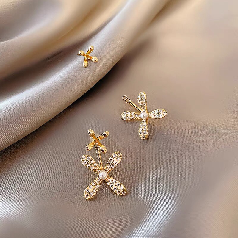 A selection of floral patterns designed with flash diamonds luxe elegance stud earrings