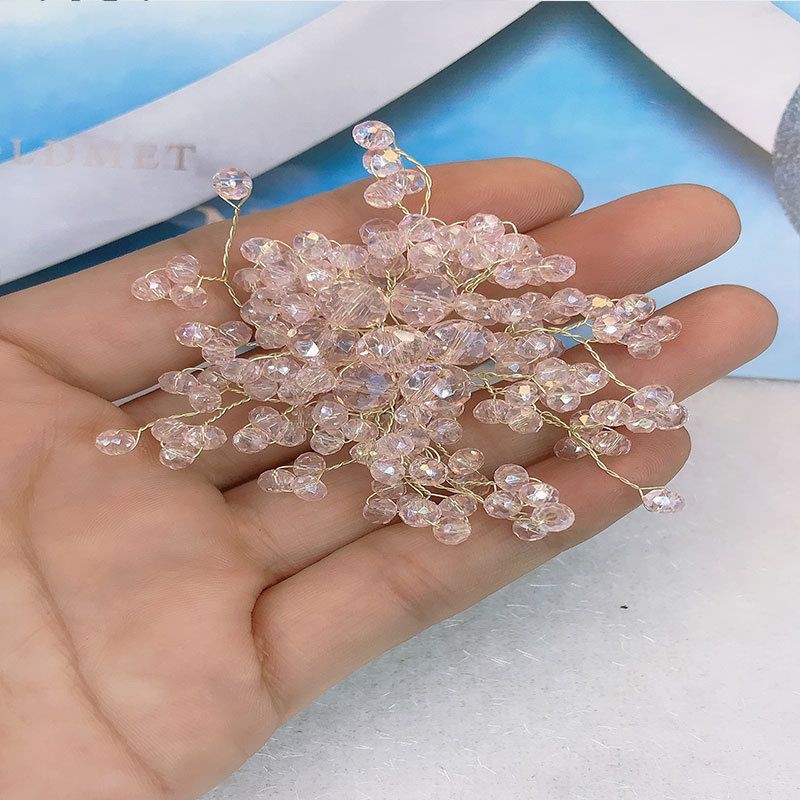 Wholesale of new clothing headscarf accessories, copper wire brooches, hair flowers, hair ornaments, crystal beaded flower plates are available details Picture
