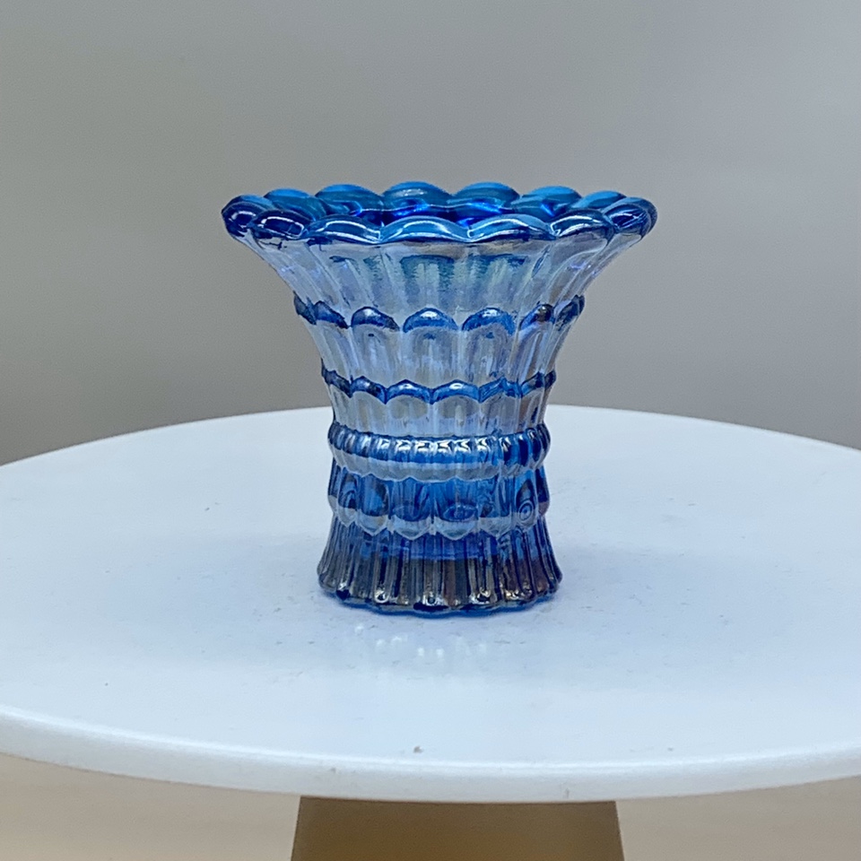 Buddhist glass candlestick ornament