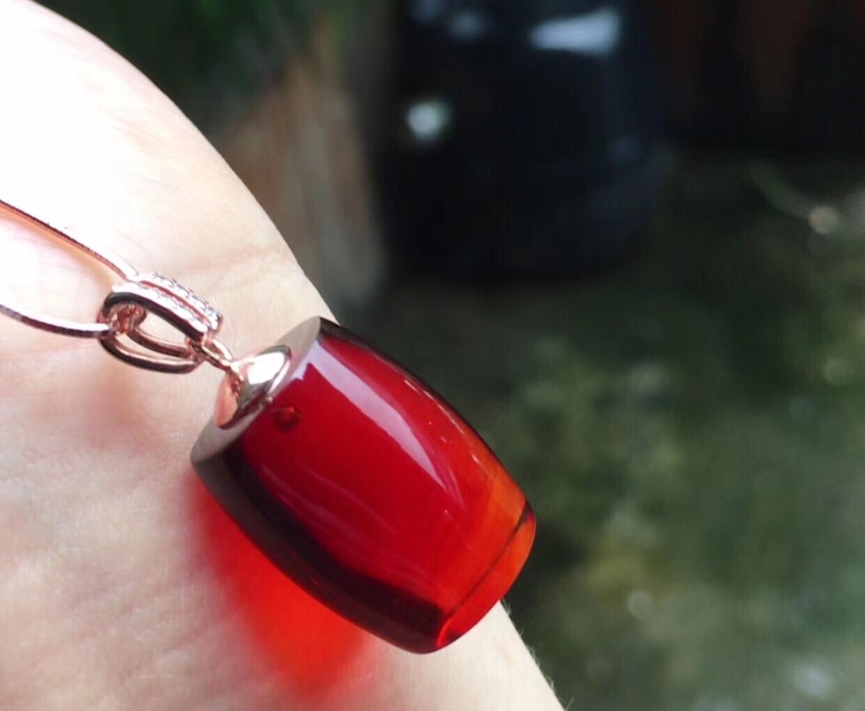 Blood amber cylinder pendant detail image 2