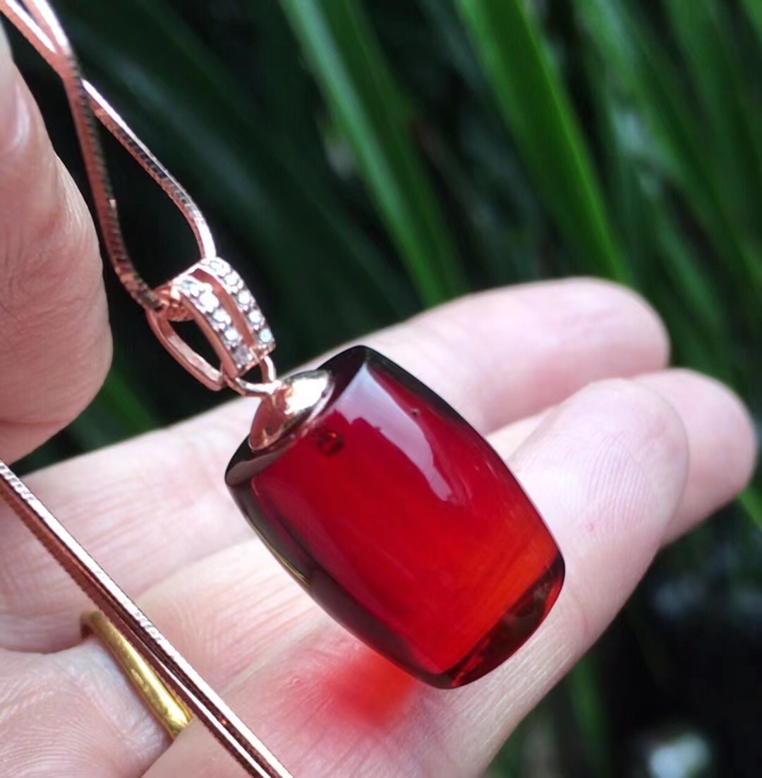 Blood amber cylinder pendant detail image 1