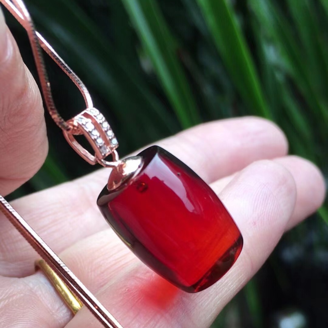 Blood amber cylinder pendant