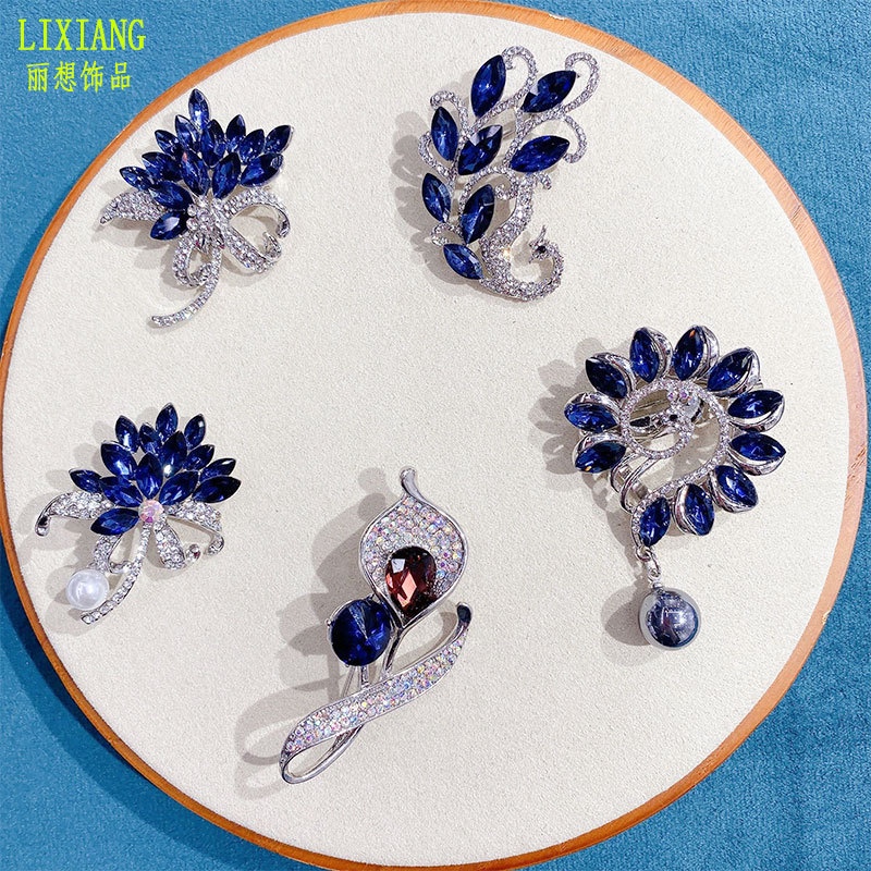 New Moland rhindiamone Bauhinia Peacock Brooch Fashion girls clothing accessories Alloy Full diamond corsage pin