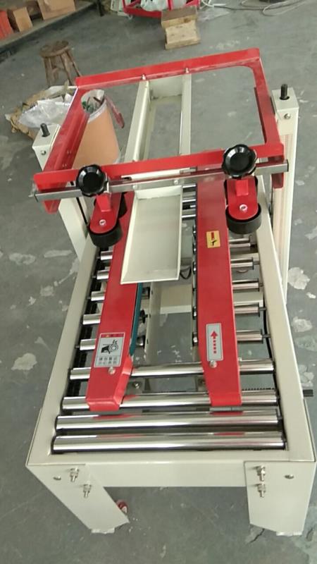 The 4030 drive box sealing machine from Hengkai Packaging Machinery is of high quality, low price and operates with integrity details Picture