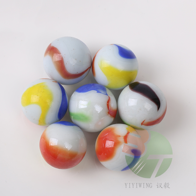 20 25mm white porcelain red, yellow and blue three-flower glass balls, 2.5cm milk white three-flower marbles, 2.5cm cream petal glass beads, jumping chess pieces, fish tank decoration round balls, nostalgic toys, egg wholesale