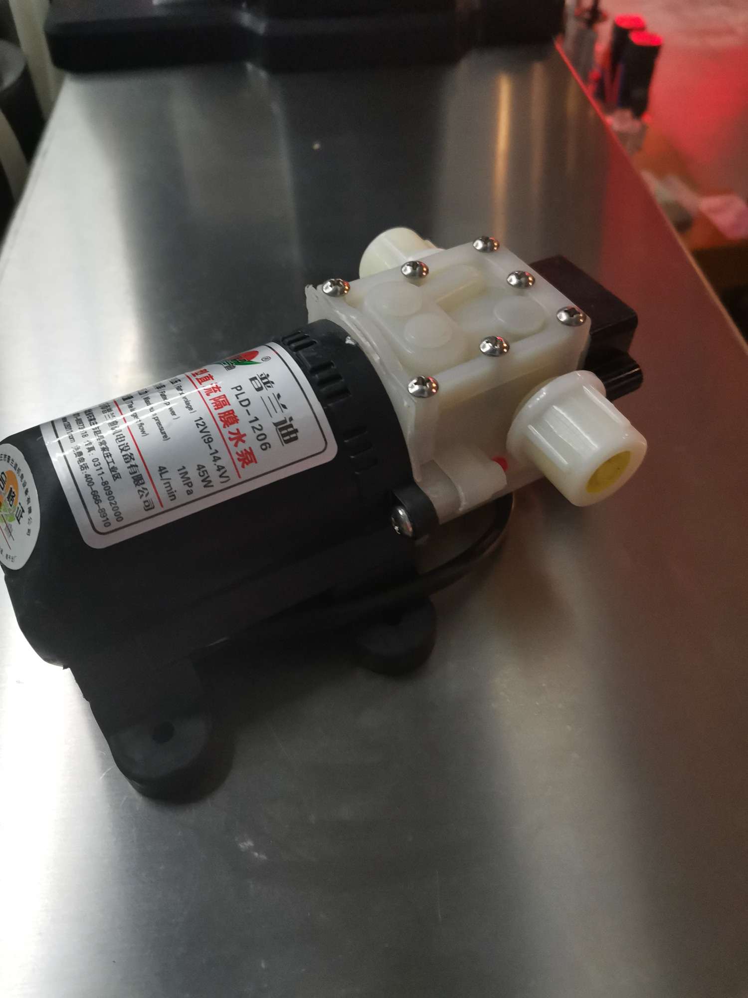 The diaphragm water pump for small CNC filling machines from Hengkai Packaging Machinery is of high quality, low price and operates with integrity detail image 2