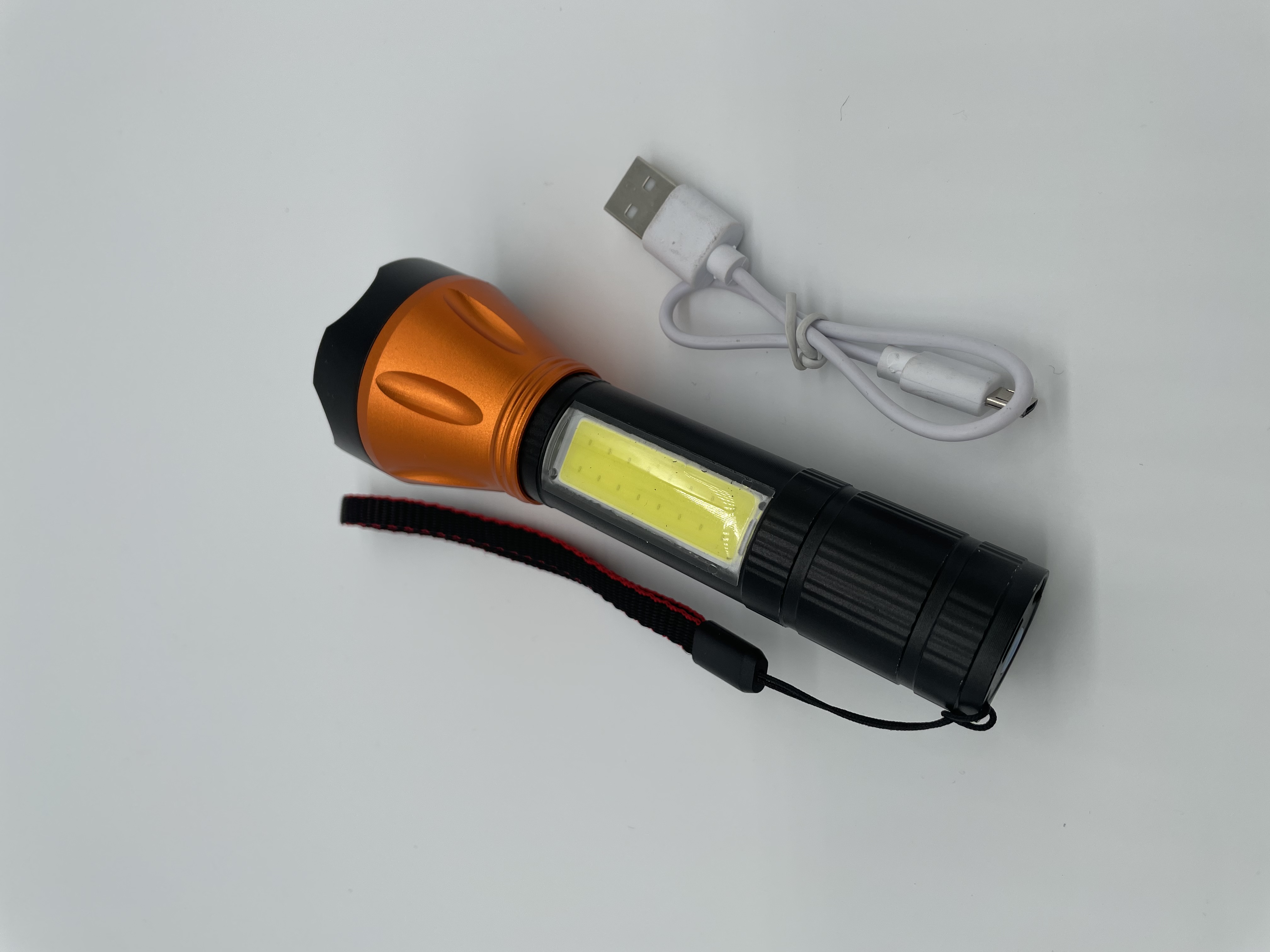新款铝合金带侧灯COB手电筒USB充电尾部充电白底实物图