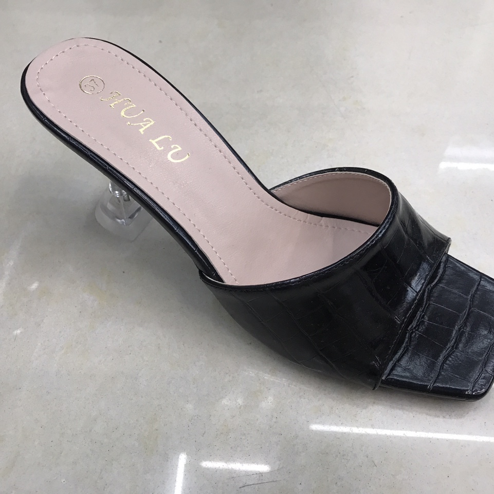 Crocodile-patterned crystal and flip-flops