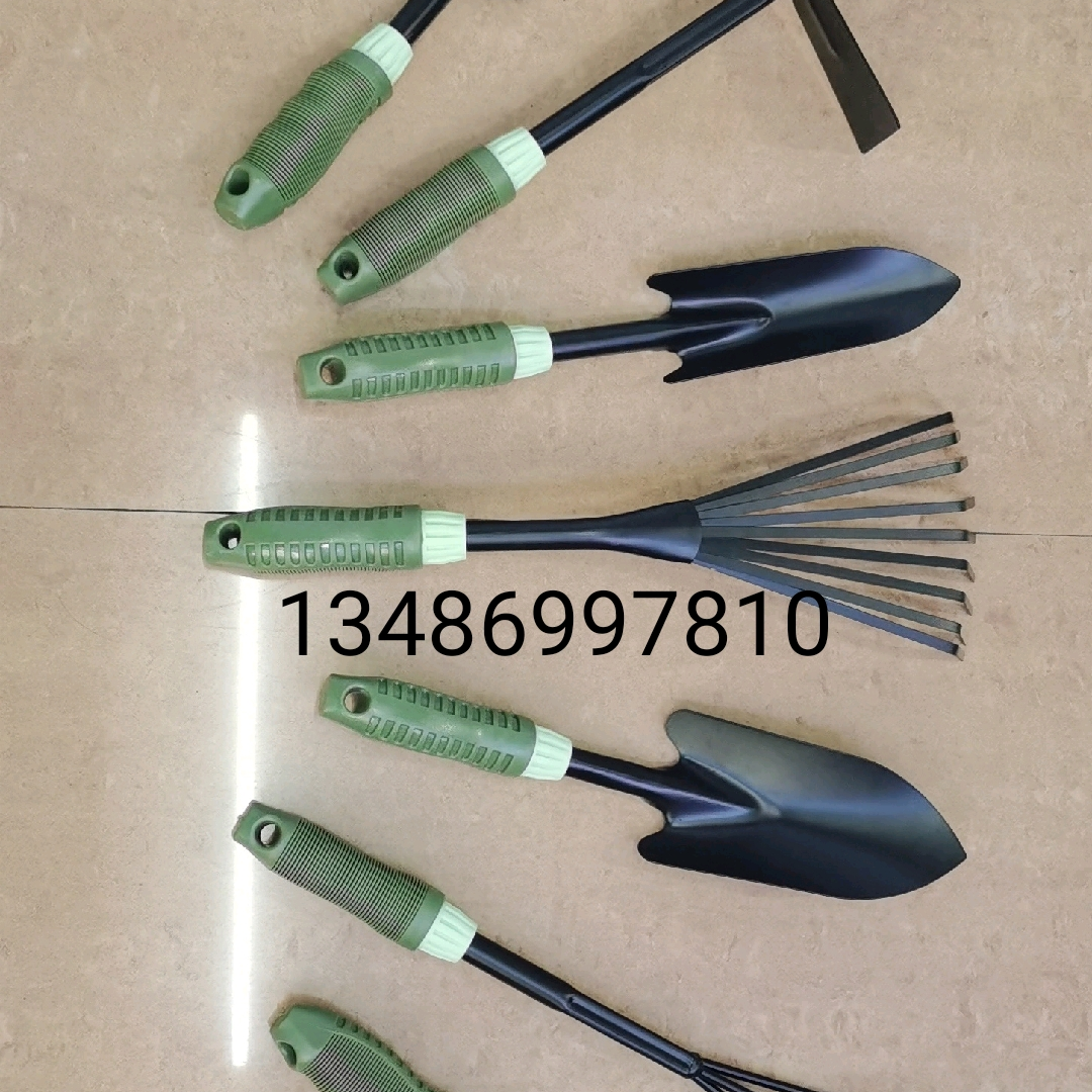Household hardware tools Garden tools Garden shovel rake full figure