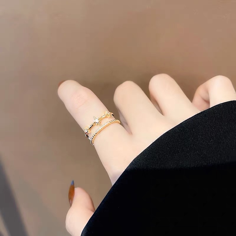 A light luxury and exquisite high-end ring with a double-layer design set with rhinestones and stars Item Picture