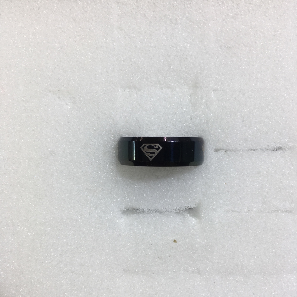 Wide-face black Superman with two beveled edges 🦸♀️ graphic design style with design series