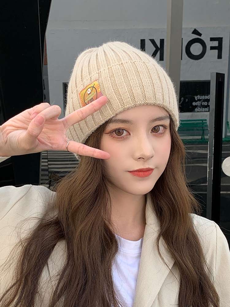 Korean college style woolen hat, children's trendy knitted hat, small Daisy warm hat, autumn and winter casual, versatile, sweet and cold hat Application Scenario