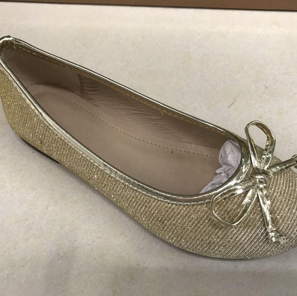 Golden flat children's shoes