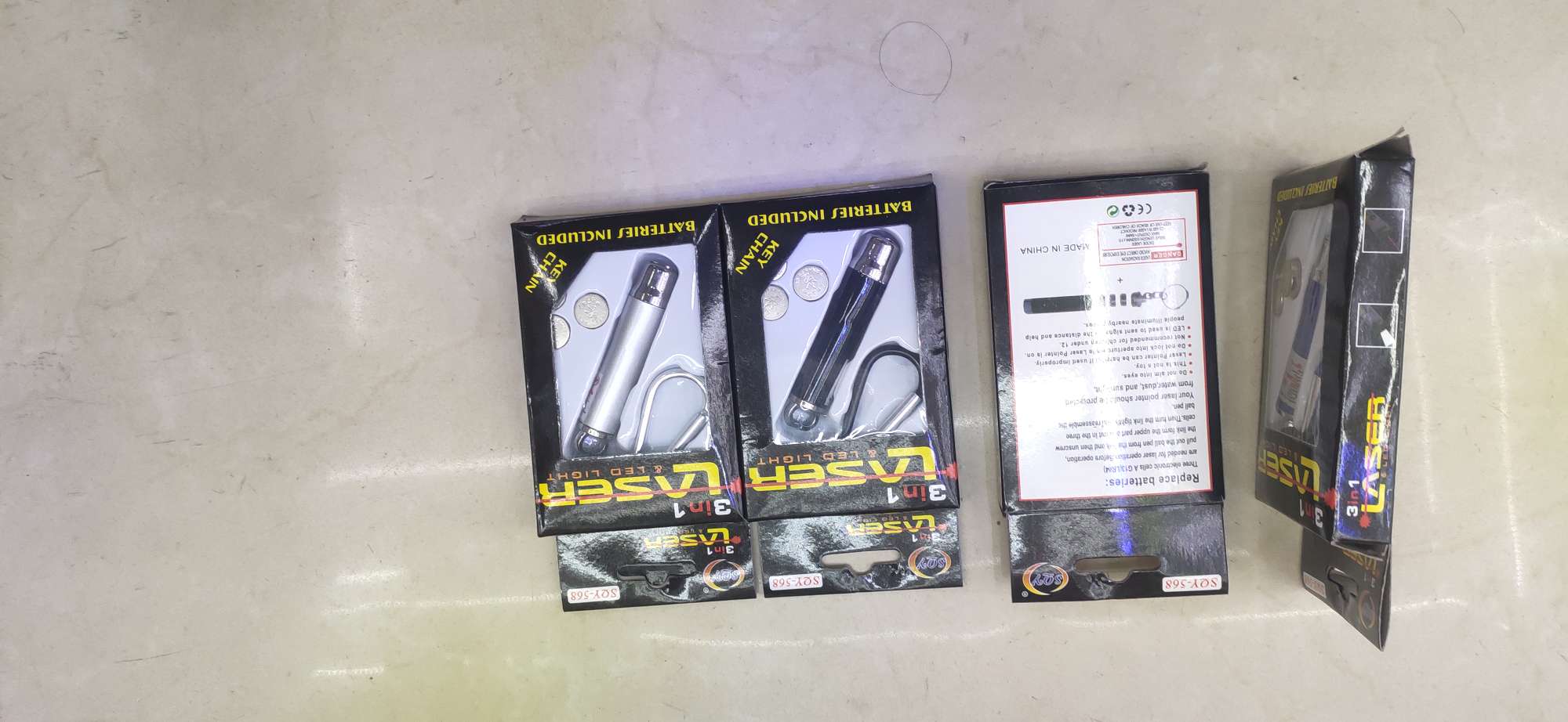 Children's toys, 568 laser keychain, banknote detector, gift, flashlight, luminous pendant, night light, street stall supply, factory direct sales Application Scenario