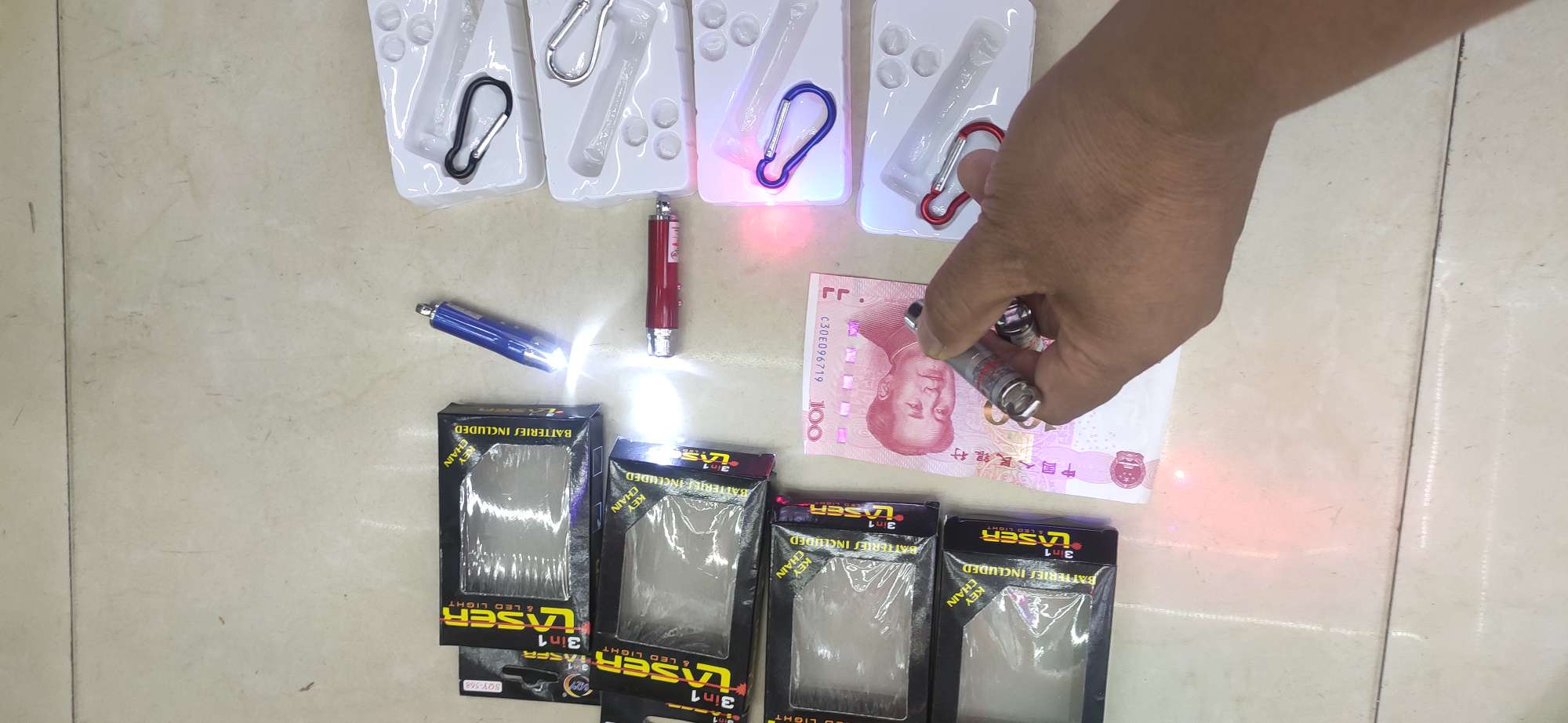 Children's toys, 568 laser keychain, banknote detector, gift, flashlight, luminous pendant, night light, street stall supply, factory direct sales Specification image