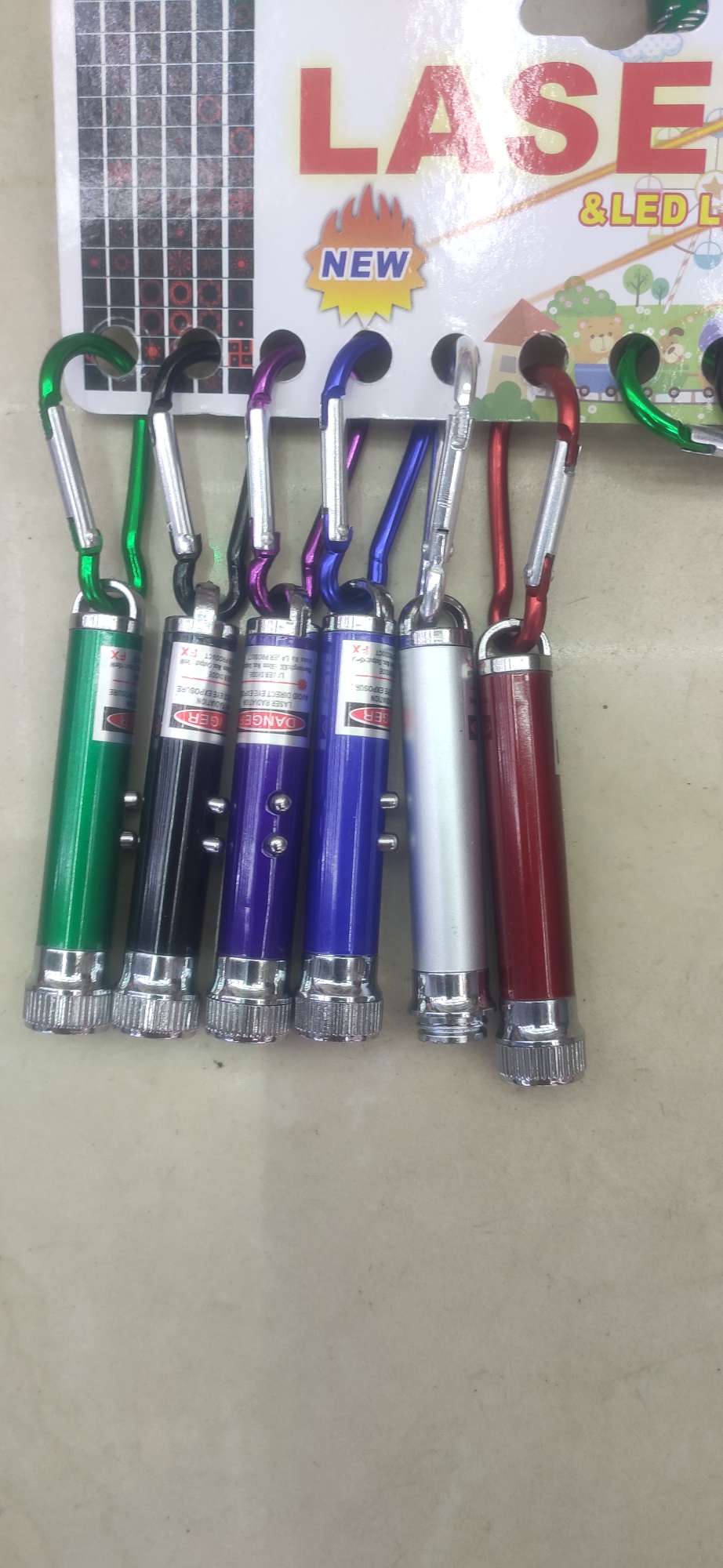 Children's toys, ordinary tubes, six-in-one keychains, laser lights, free gifts, projection flashlights, street stall supply, factory direct sales Item Picture