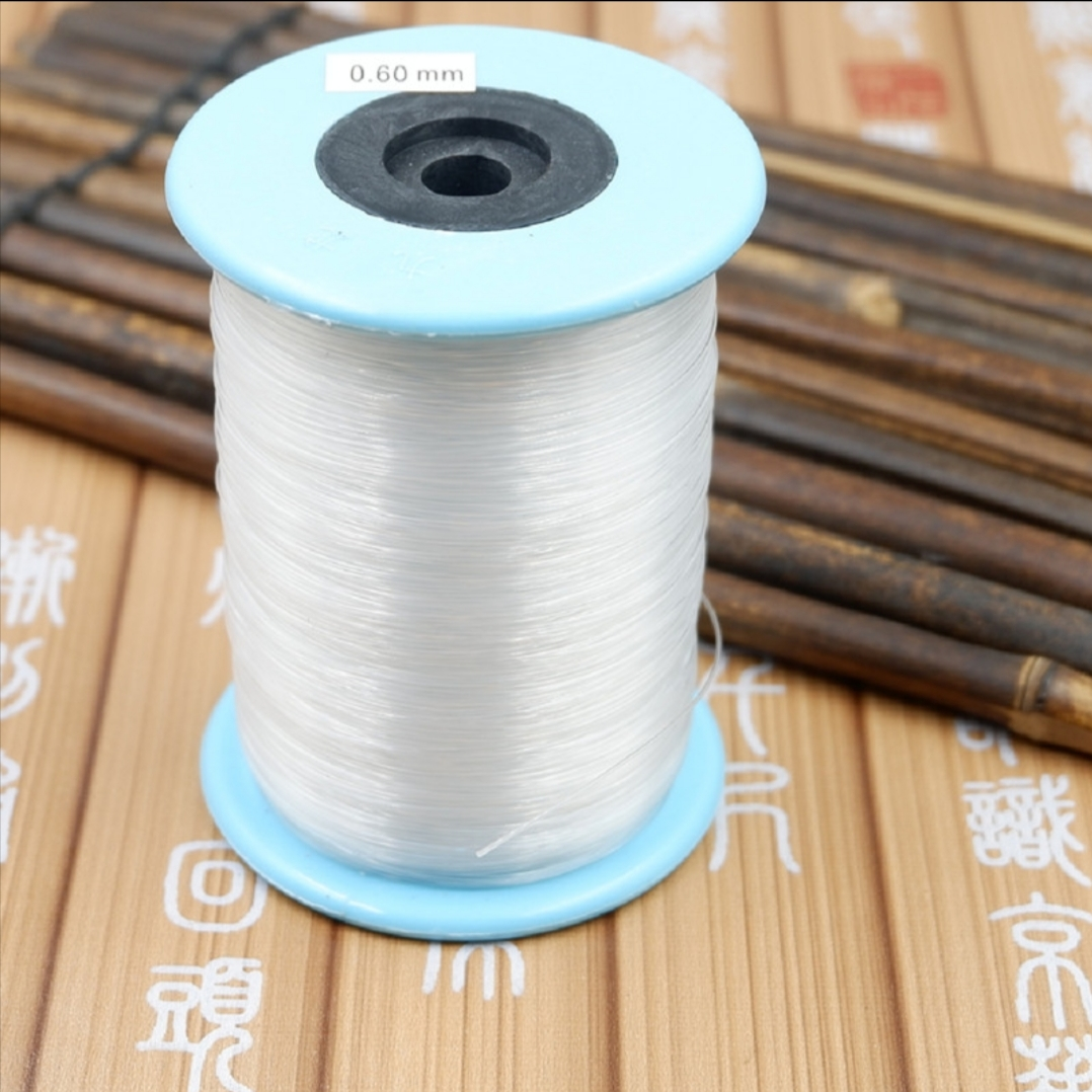 Large roll 0.6mm non-stretch fishing line wrapped ring line Transparent fish silk line DIY hand-woven paper towel box beaded fish